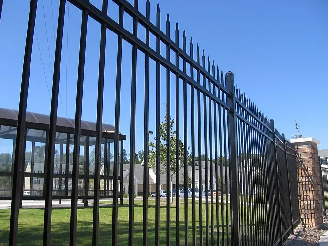 Rural fence installation near farmland